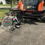 cutting asphalt with skid steer