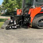cold planer digging into asphalt