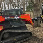 skid steer with wood splitter