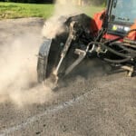 skid steer road saw digging