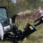 chipping wood with skid steer