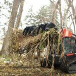 industrial grapple moving debris