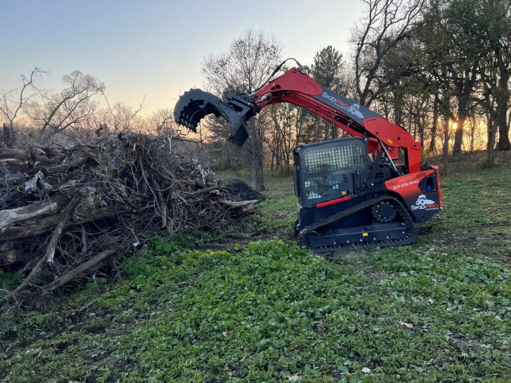 Industrial Grapple Rake Field