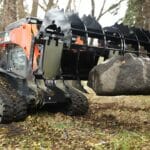 grapple rake moving boulders