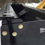 edging building with snow pusher