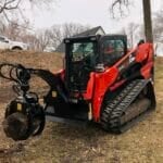 log grapple in field