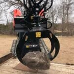 log grapple in field