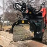 log grapple in field