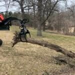 log grapple in field