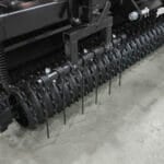 tines on skid loader seeder