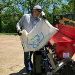 dumping seed into seeder hopper