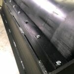 Vibratory Roller adjustable scraper bar