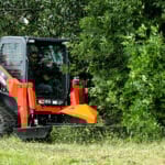 brush mower in yard