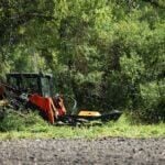 brush cutter in field