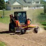 conditioning soil with skid steer