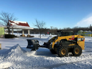 Skid steer v-blade