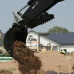 Backhoe with dirt
