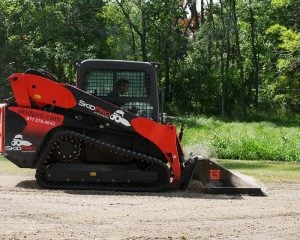 land leveler on dirt road
