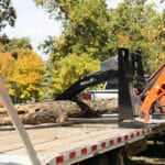 pallet fork grapple unloading trailer
