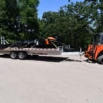 skid steer pulling trailer