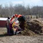 mini skid steer dirt bucket cleaning