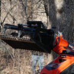 skid steer mini rock grapple with rocks