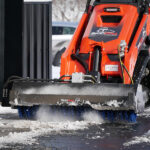 mini angle broom brushing snow