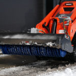 skid steer mini sweeper