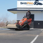 pickup broom in parking lot