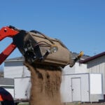 pickup broom dumping dirt