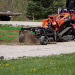 mini soil conditioner on driveway