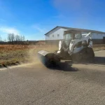 sweeping dirt and rocks