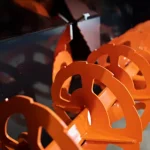 serrated auger on skid steer snowblower