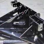 skid steer steps on snow blade