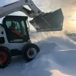 snow bucket in field